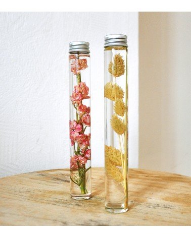 Tubes de fleurs immergés rose et beige