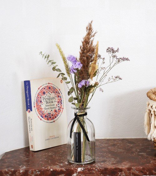 Bouquet de fleurs séchées bleu en vase